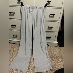 Grey work pants. Stretchy with a button